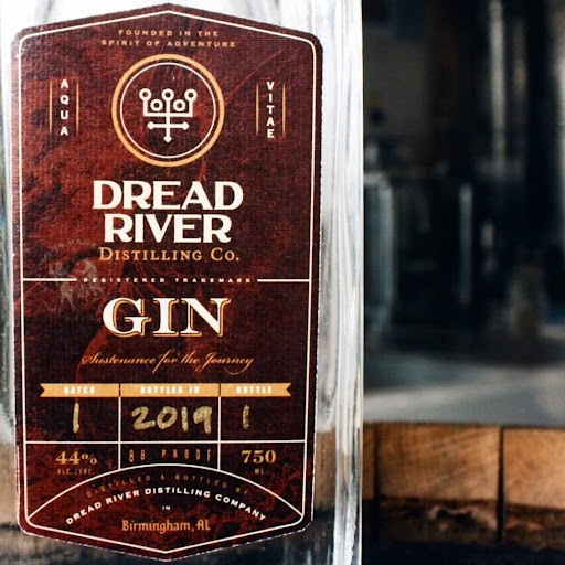 Close-up of Dread River Gin bottle emphasizing juniper-forward profile with citrus and menthol notes.
