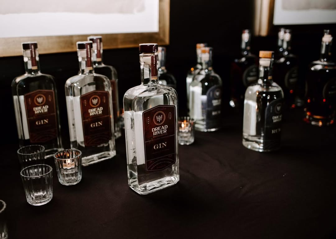 Assorted Dread River Gin bottles highlighting seasonal botanicals like yuzu, sakura flower, and gyokuro tea.