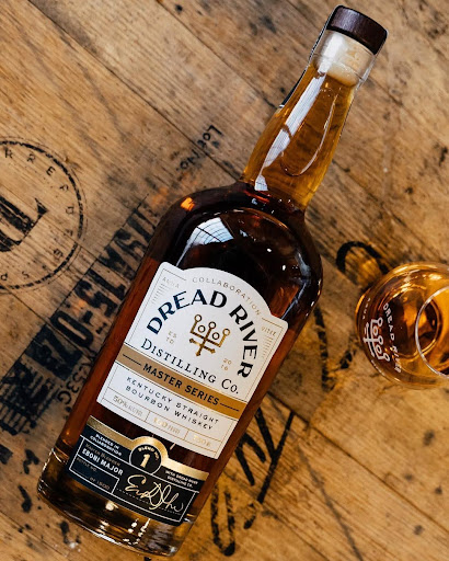 A flat-lay shot of Kentucky Straight Bourbon Whiskey from Dread River Distilling Co., featuring its classic amber color and bold label.
