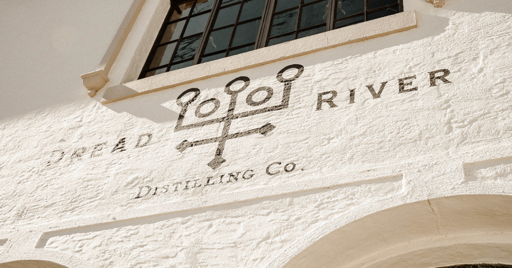 The entrance to Dread River Distilling Co., where whiskey aging and craftsmanship come together.
