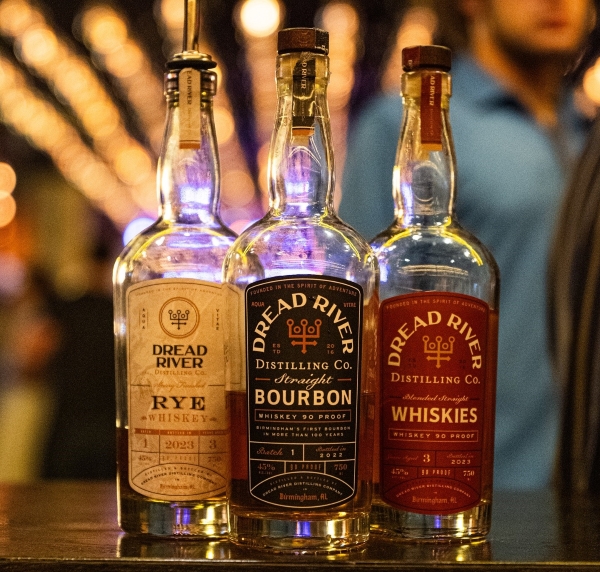 A collection of Dread River Bourbon bottles for crafting unique July 4th cocktails.