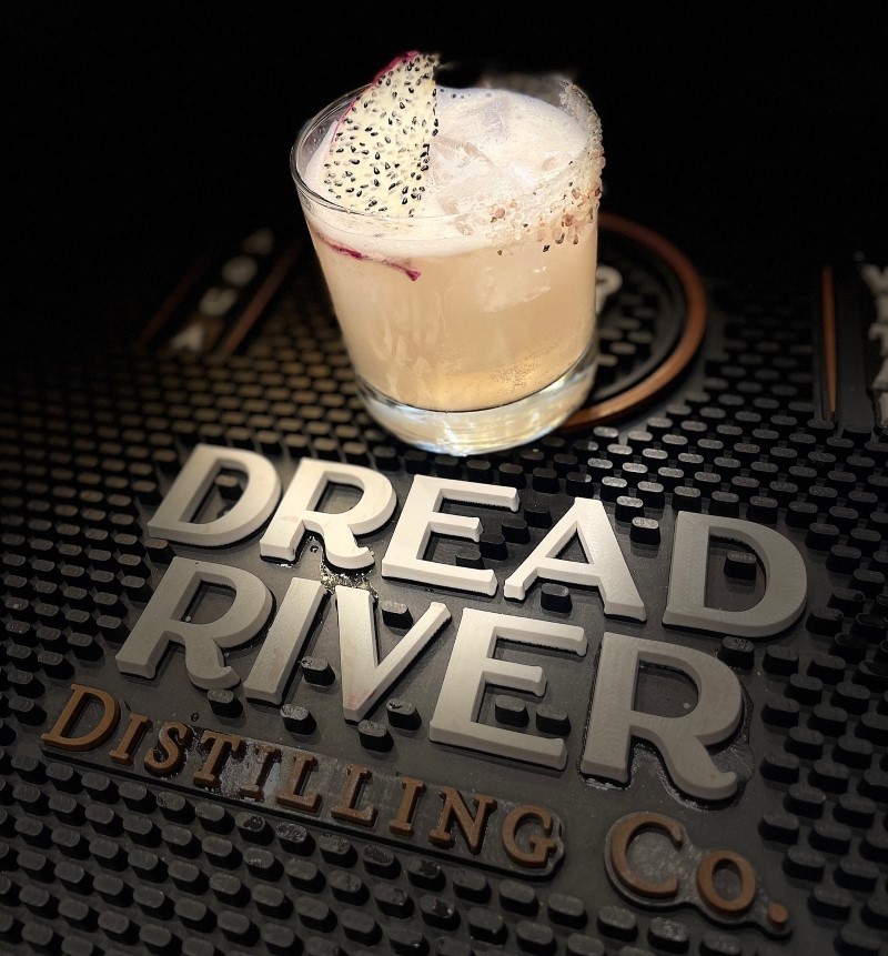 A glass of cocktail made with whiskey from Dread River Distilling Co.