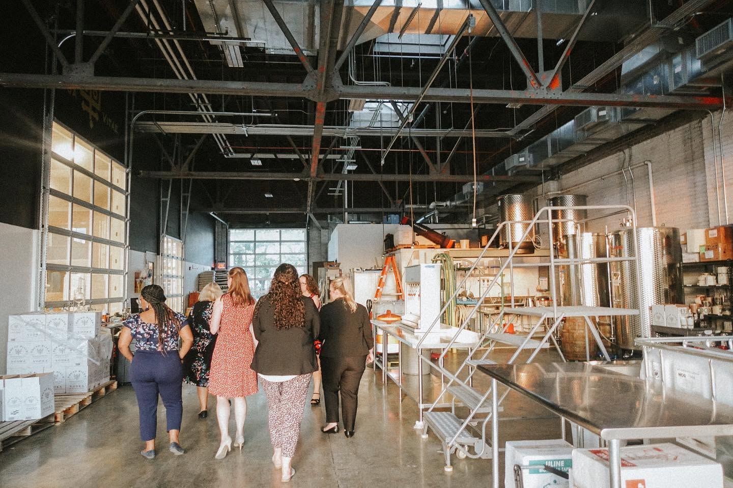 Guests walking through the production area during a Dread River Distilling Co. distillery tour.